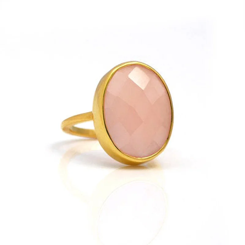 women's engagement ring with geometric shapes -Pink Chalcedony large oval bezel set ring • October Birthstone