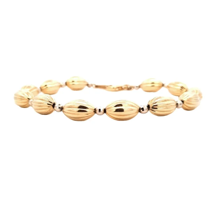 women's gemstone bracelet -Estate Oval Ribbed Link Bracelet in 14K Yellow and White Gold