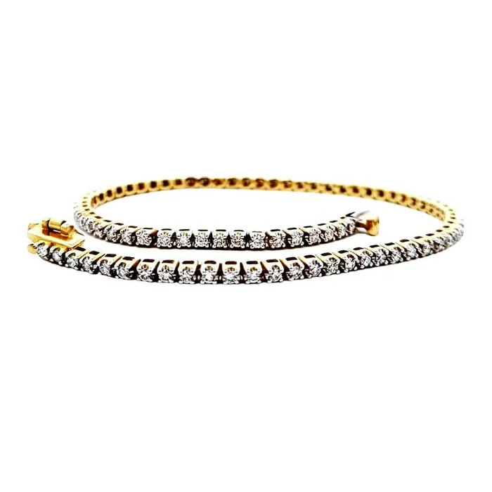 women's tribal bracelet -Mountz Collection 1.0CTW Illusion Set Diamond Straightline Bracelet in 14K Yellow Gold