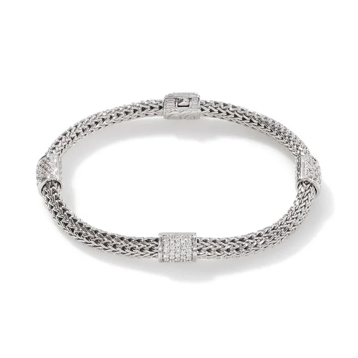 women's vintage bangles -.73D 4-Station Pave Chain Bracelet S/S & 18K WG: (4) stations each containing (23) Rd pave set Diamonds evenly spaced across a 5MM Classic Chain. Sz UXL